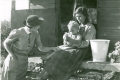 District nurse visiting a gypsy caravan - 1940s